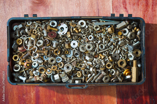 iron screw nuts in the box © nikkytok