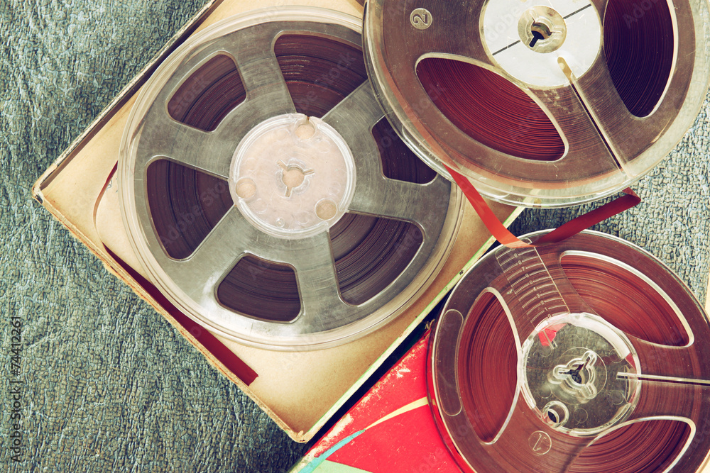Top view of old sound recording tape, reel to reel type and box with room  for text. filtered image Stock Photo by ©tomert 59381319, sound recording  tape