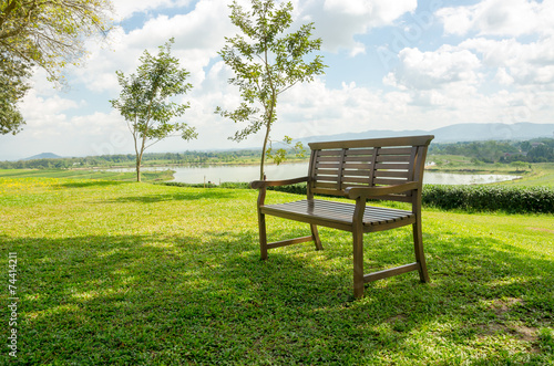 Bench in beautiful garden in Singha park Chiang Rai,Thailand