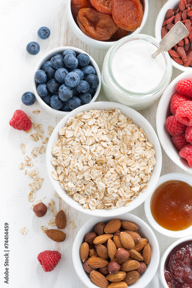 cereal and various delicious ingredients for breakfast, vertical cereal and various delicious ingredients for breakfast, vertical