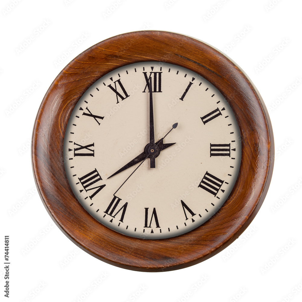 Vintage clockface showing eight o'clock in wooden frame
