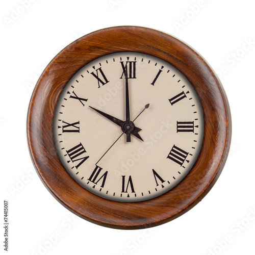 Vintage clockface showing ten o'clock in wooden frame