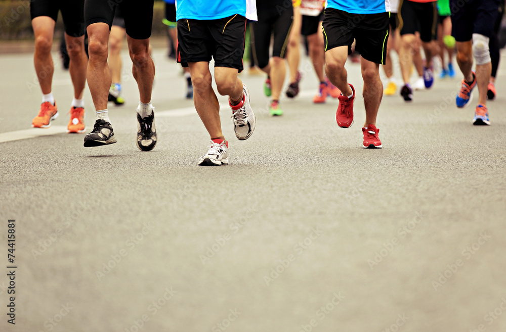 marathon runner legs running on street marathon runner legs running on street