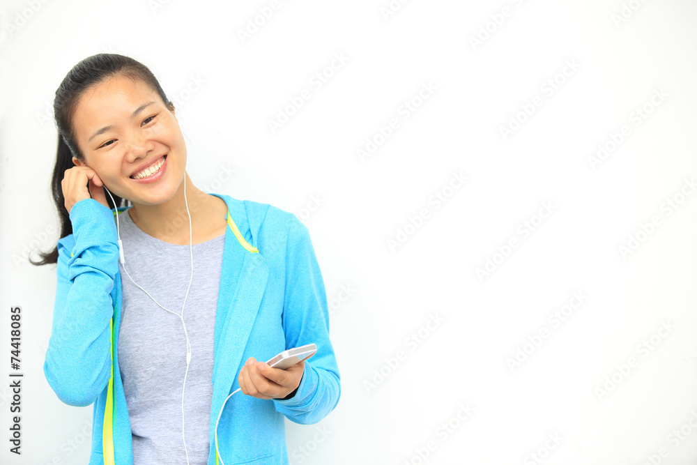 happy beautiful young asian woman enjoying the music happy beautiful young asian woman enjoying the music