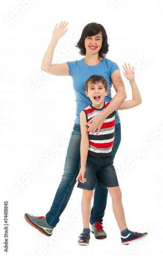 Smiling mother and son isolated on white