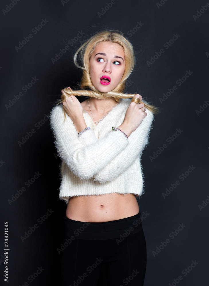 Obraz premium Funny woman portrait on black background