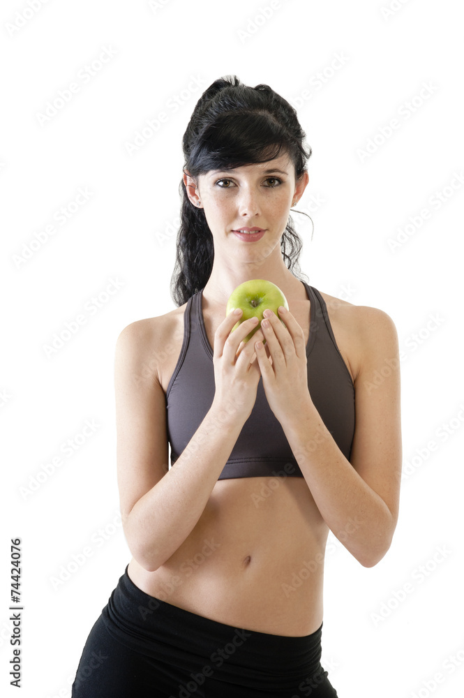 Young attractive exercise girl with green apple Young attractive exercise girl with green apple