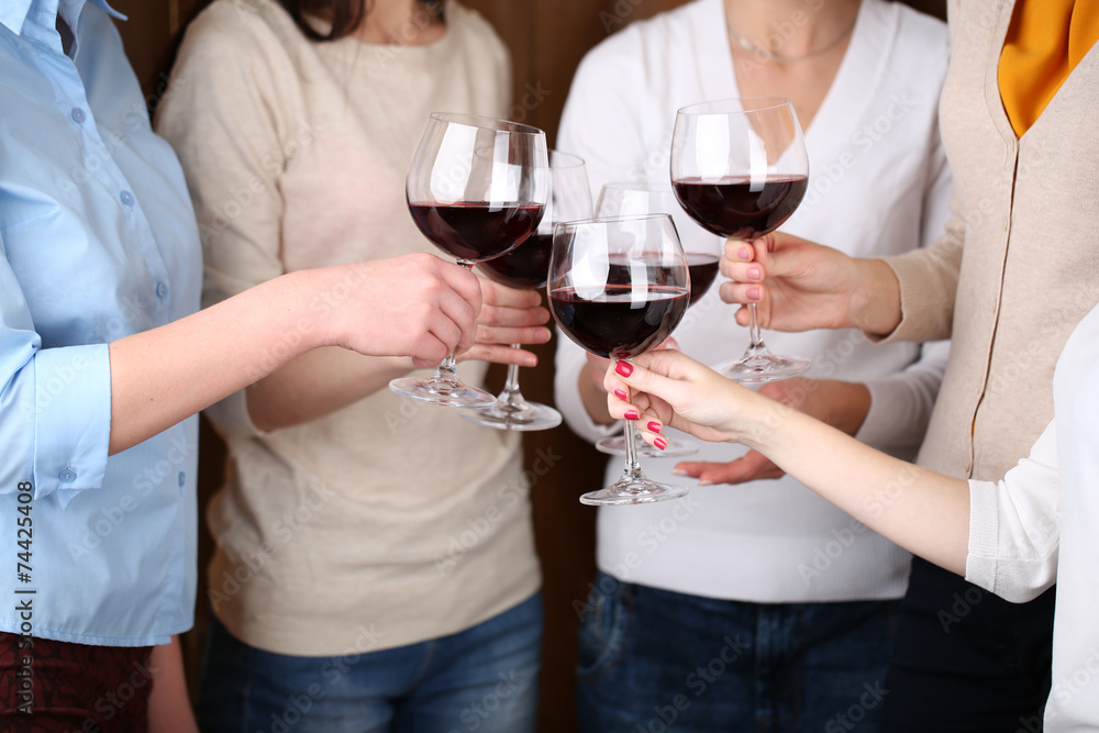 Woman hands with glasses of wine close-up Woman hands with glasses of wine close-up