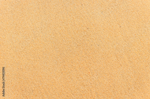 Texture of sand and footprints in the sand
