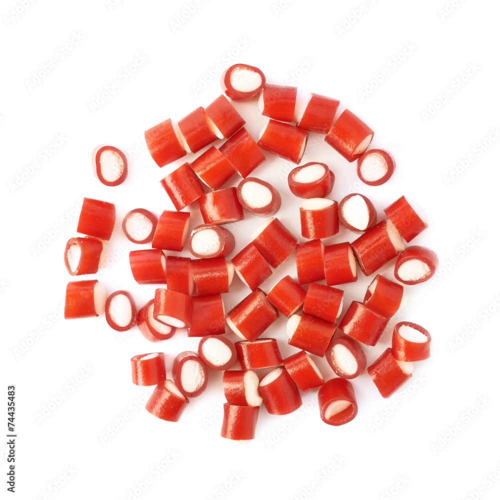 Pile of small red candy sweets isolated