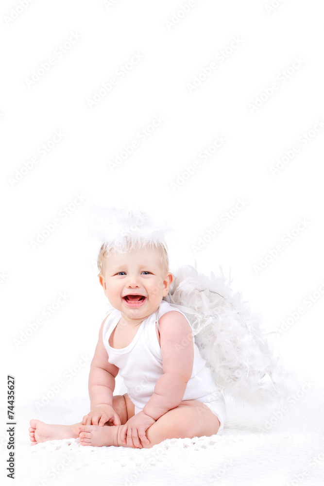Small angel with the wings isolated on the white. Small angel with the wings isolated on the white.