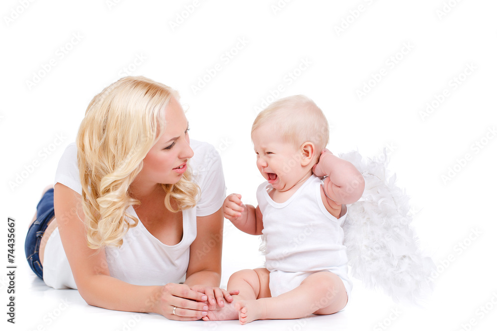 Beautiful mother with the angelic child. Beautiful mother with the angelic child.