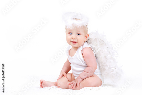 Small angel with the wings isolated on the white.