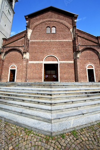 cardano al campo in    old   church   tower sidewalk italy  lomb photo