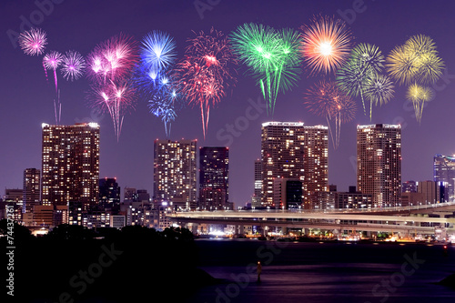 Fireworks celebrating over Odaiba, Tokyo cityscape at night © geargodz
