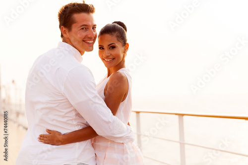 newlywed couple looking back on cruise