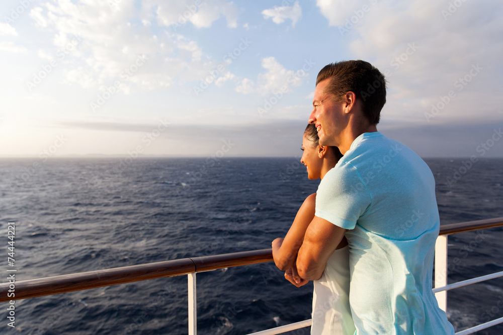 couple enjoying sea view in the morning on a cruise ship