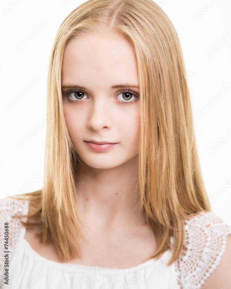 Blond Young Teenage Girl Dressed In White in the Studio Blond Young Teenage Girl Dressed In White in the Studio