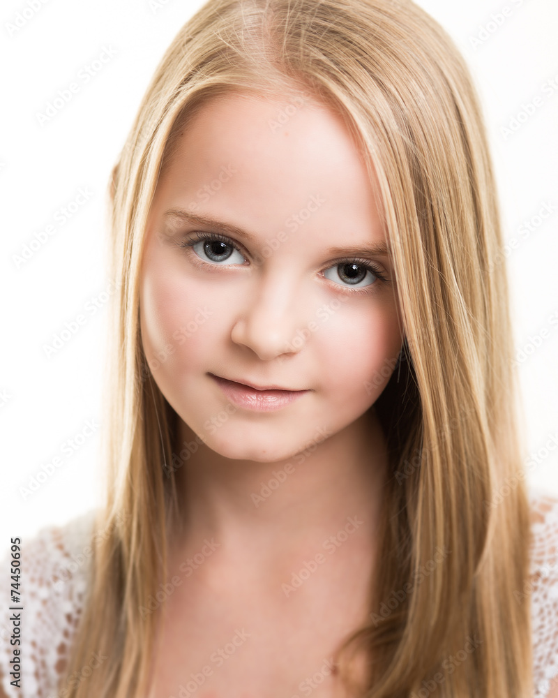 Blond Young Teenage Girl Dressed In White in the Studio Blond Young Teenage Girl Dressed In White in the Studio