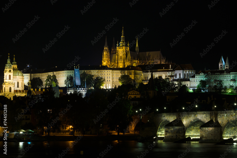 Prague Castle and the Charles Bridge at night illumination.