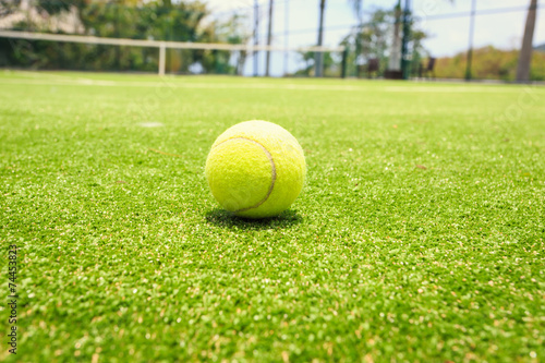 Tennis court with tennis ball © SKT Studio