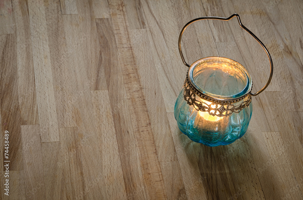 vintage candle lantern on a wooden table