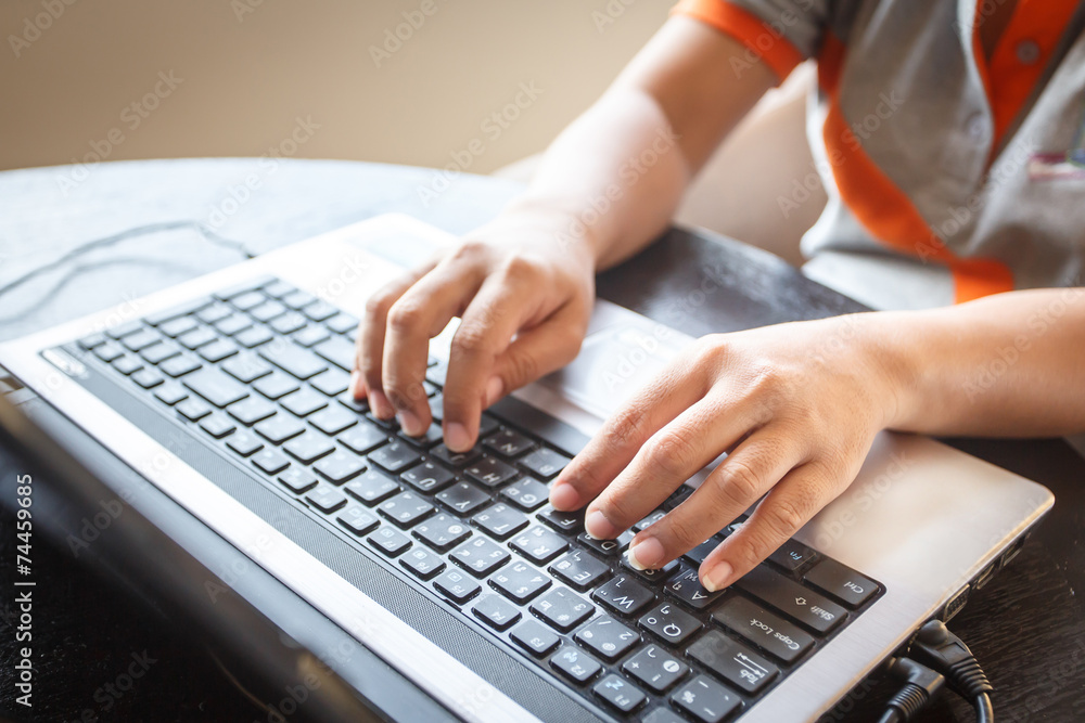 Hand using laptop Hand using laptop