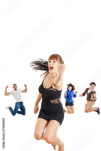 Glamour woman in dark dress or girl jumping with fist up