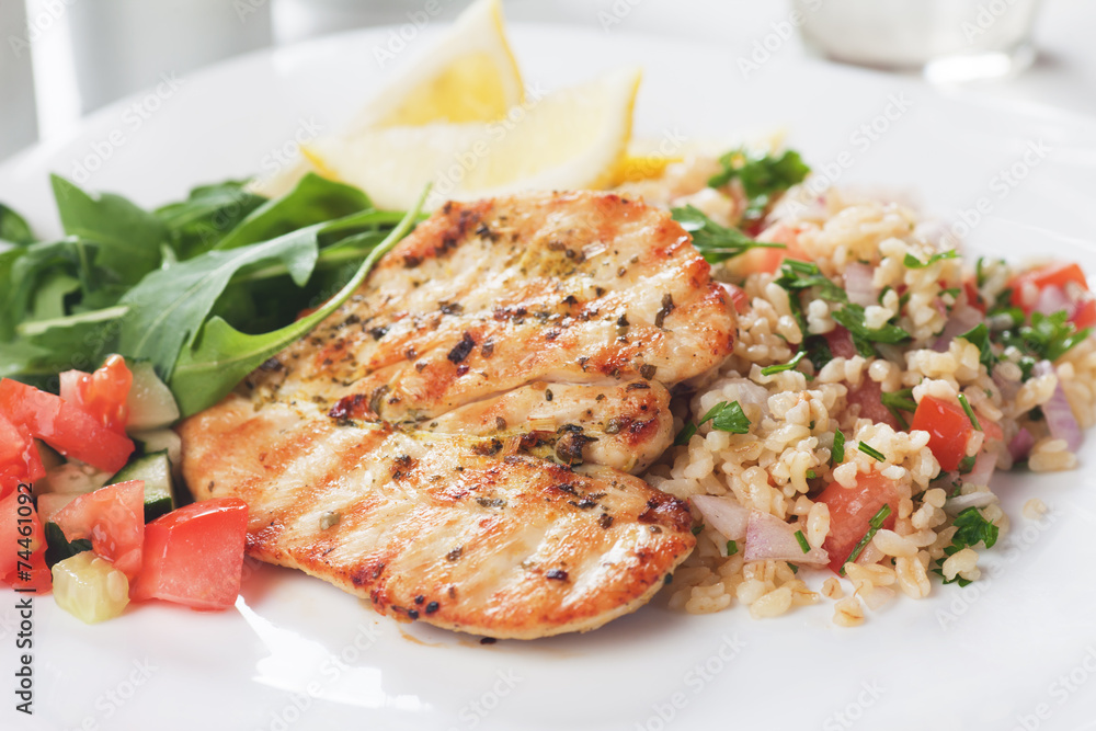 Chicken meat with bulgur and rocket salad Chicken meat with bulgur and rocket salad