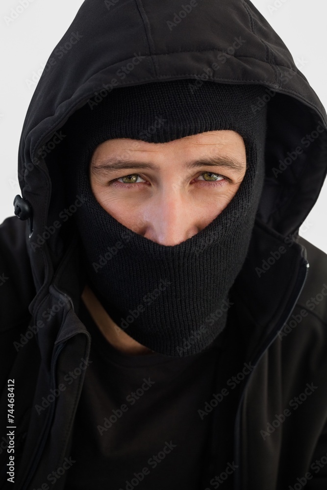 Portrait of burglar wearing a balaclava