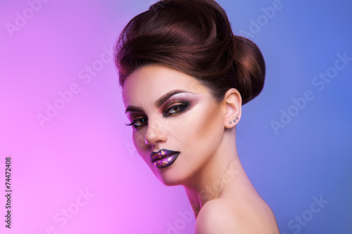 Horizontal portrait of charming adult brunette with make up and