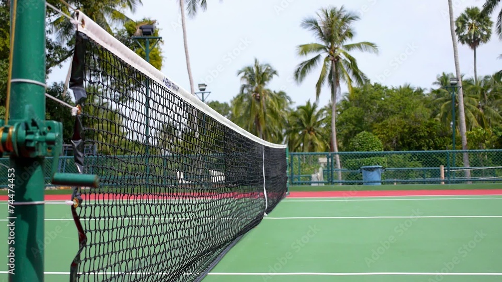 Practicing on Tennis Court. Playing Tennis Outdoors. Practicing on Tennis Court. Playing Tennis Outdoors.