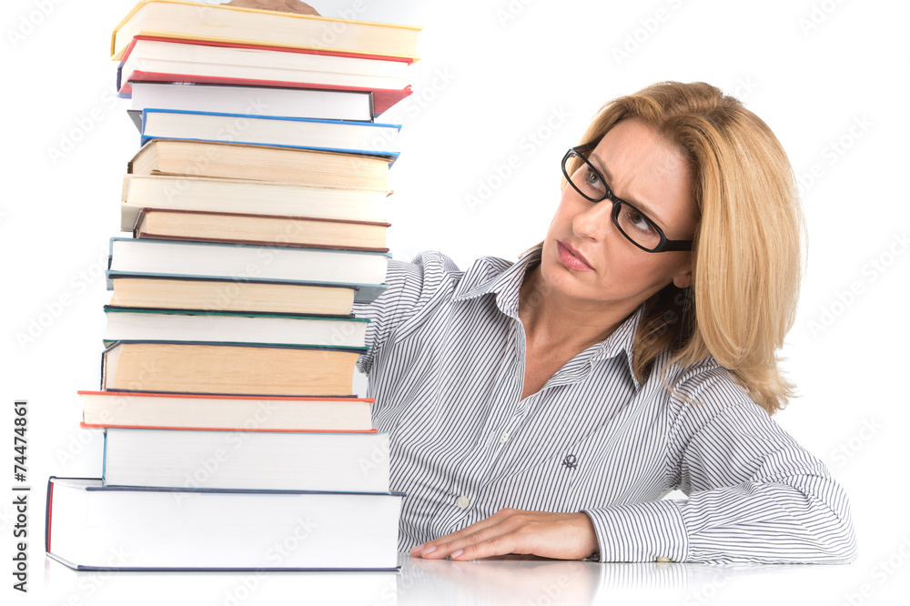 Portrait of confident female advocate looking at books. Portrait of confident female advocate looking at books.