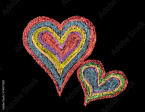 Conceptual image of love  with two vivid color shape hearts