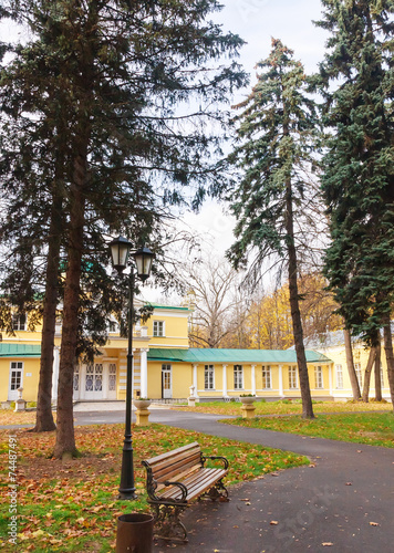 The old mansion in the park in autumn photo