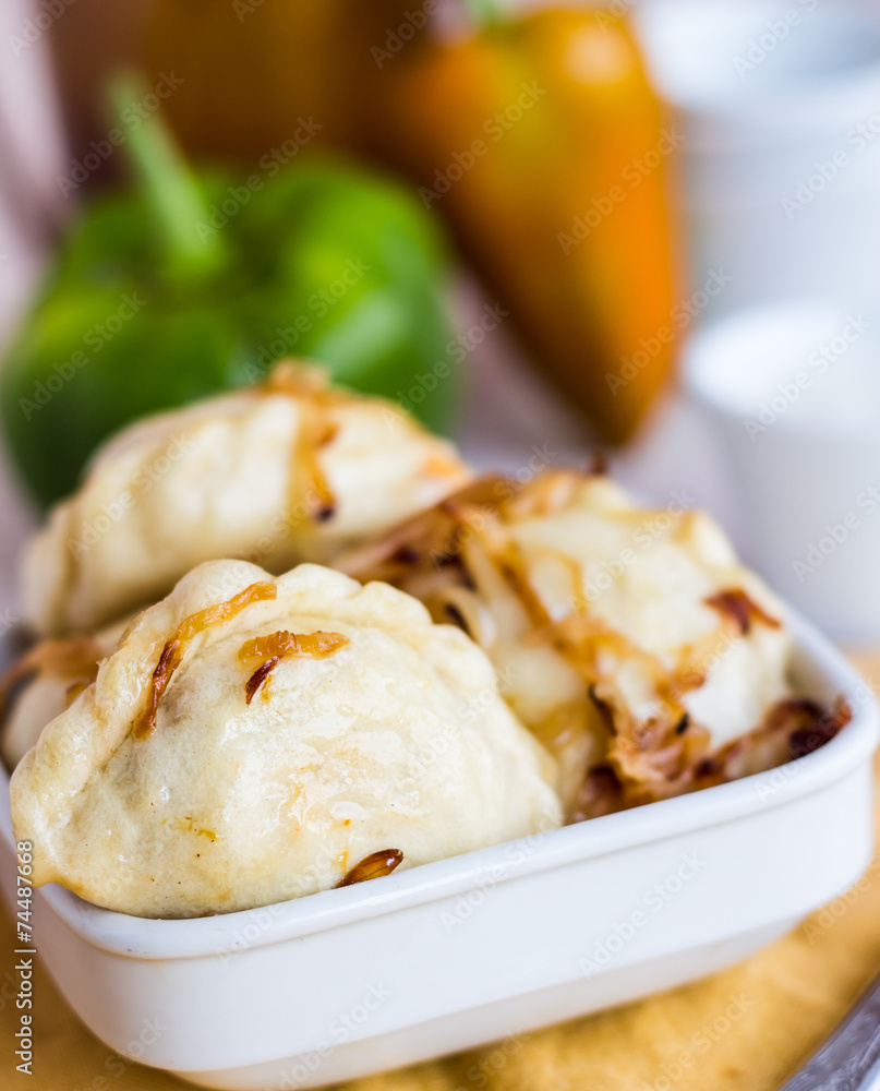 dumplings with cabbage and fried onions, Ukrainian cuisine dumplings with cabbage and fried onions, Ukrainian cuisine