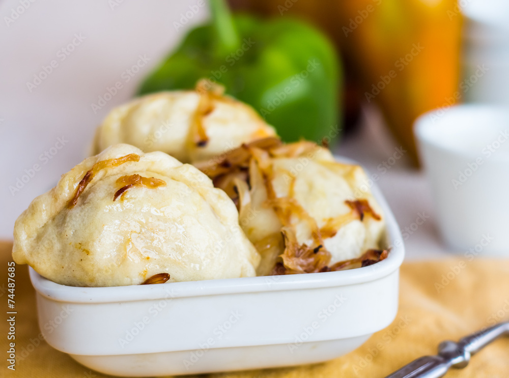 dumplings with cabbage and fried onions, Ukrainian cuisine dumplings with cabbage and fried onions, Ukrainian cuisine