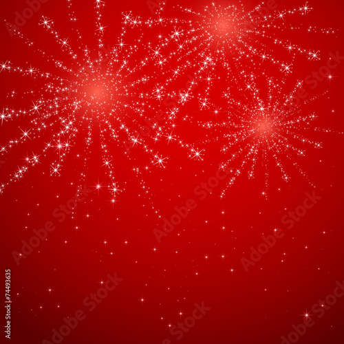 Fireworks on red shiny background