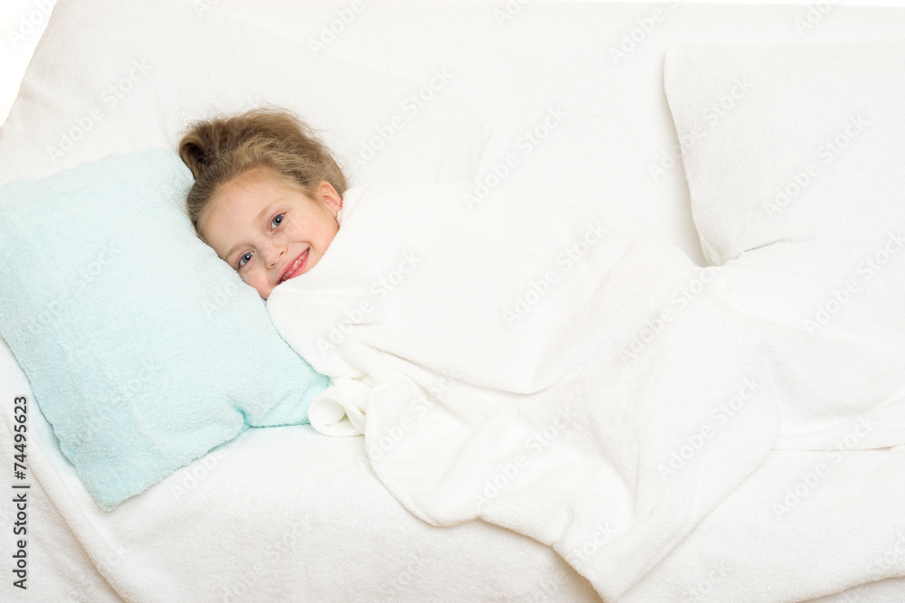 little girl in bed