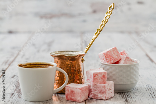 Traditional Turkish Coffee Served with Turkish Delight on White Wooden Background