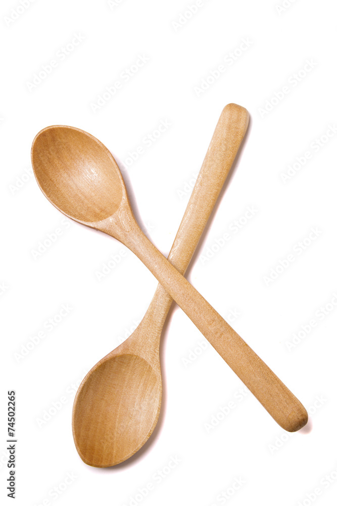 two crossed wooden spoons two crossed wooden spoons