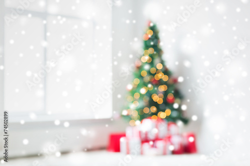 room with christmas tree and presents background