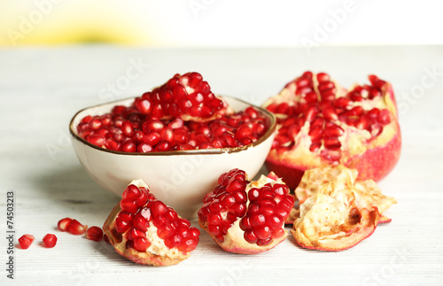 Beautiful composition with juicy pomegranate seeds,