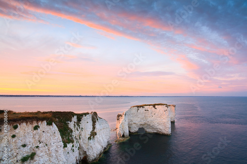 Chalk cliffs and Old Harry rocks in eastern Dorset, UK. photo