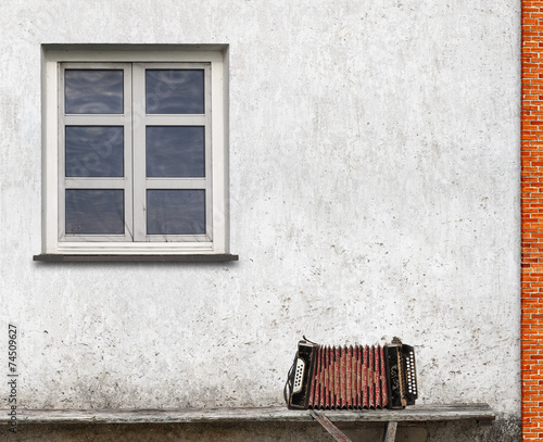 accordion on the bench photo