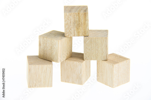 Wooden toy blocks isolated on white background