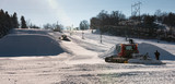 Workers build terrain park at ski field, Afton Alps, Minnesota,