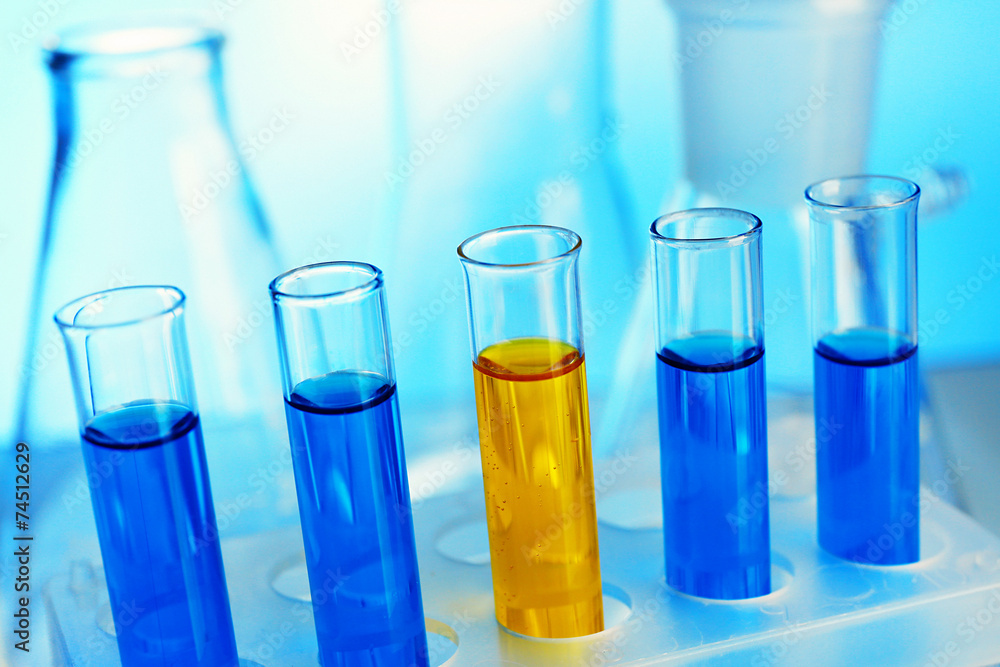 Test-tubes filled with color fluid close-up Test-tubes filled with color fluid close-up
