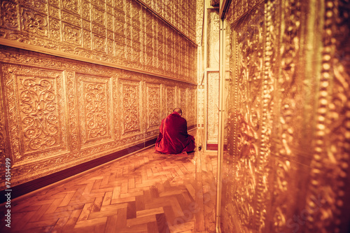 MYANMAR - FEBRUARY 9: Unidentified Monk in Red suit make meditat
