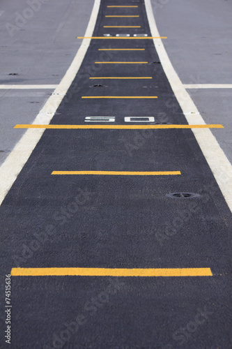 Yellow numbers and lines - Stock Image